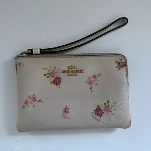 Coach Wristlet. Cream with floral design